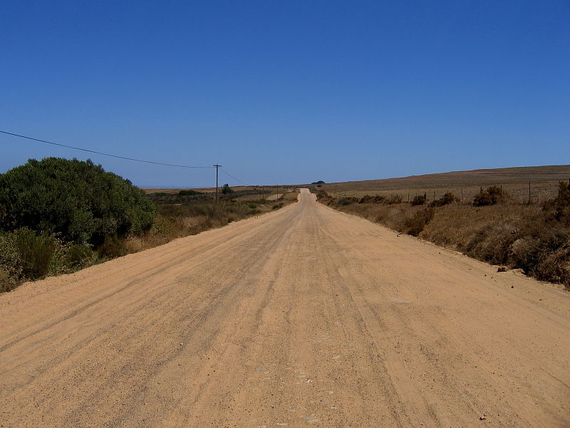 Route cutting across the Darling Farmlands off the main west coast R27 road north of Cape town, South Africa © Steve Ogden