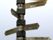 Cape Point sign post showing distances and direction to world cities