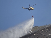 Fire fighting with helicopter at Kirstenbosch National Botanical Gardens, Cape Town, South Africa
